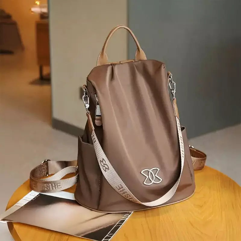#694C46